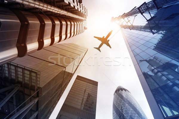 機 高層 建築物 飛行 辦公樓 太陽 商業照片 © unkreatives