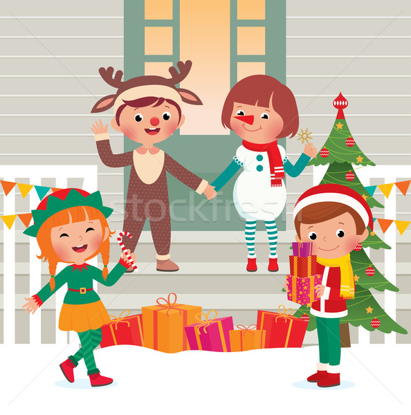 Children on the doorstep in Christmas Costumes Stock photo © UrchenkoJulia