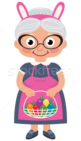 Grandmother holding a basket with Easter eggs Stock photo © UrchenkoJulia