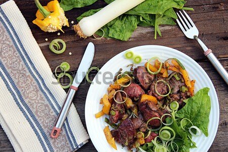 Delicious dinner. Chicken liver with paprika, leek and spinach  Stock photo © user_11056481