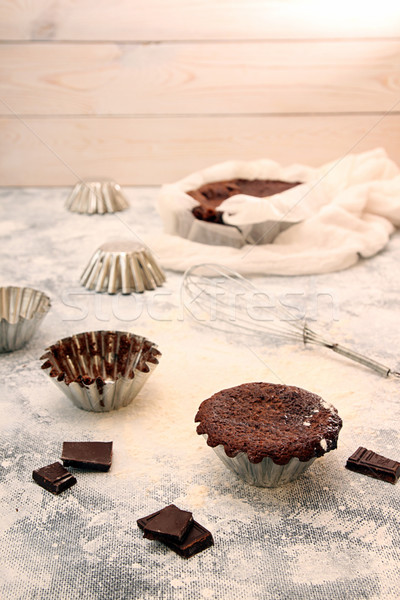 Still life with chocolate cupcake and baking utensils Stock photo © user_11056481