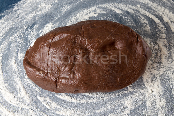 Gingerbread dough for Christmas cookies on blue wooden table. Stock photo © user_11056481