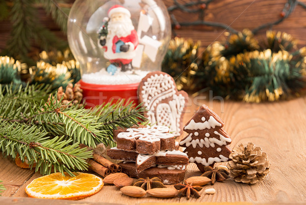 Christmas gingerbread cookies against background sphere with San Stock photo © user_11056481