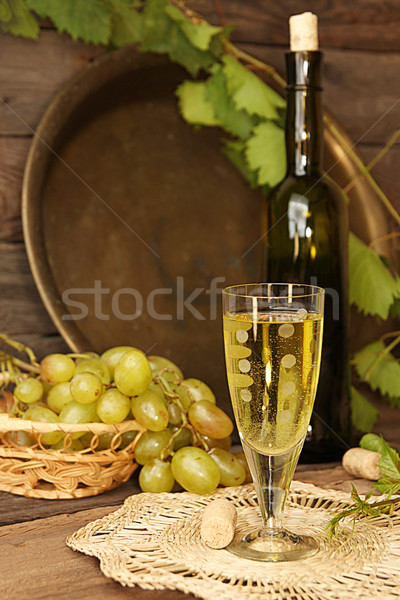 Vintage wine glass against background cluster of grapes and wine Stock photo © user_11056481