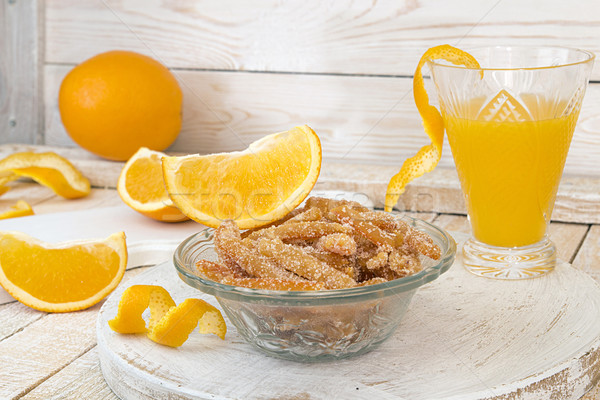 Homemade candied orange peels in glass bowl Stock photo © user_11056481