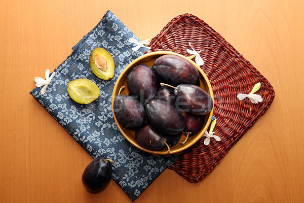 Organic homegrown plums in ceramic bowl Stock photo © user_11056481
