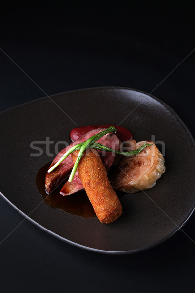 Delicious dinner. Duck breast of a kromesk from a duck leg plum  Stock photo © user_11056481