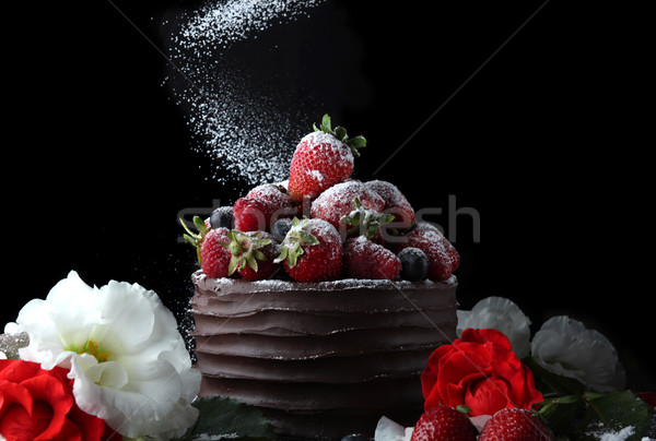 Cake with chocolate decorating with strawberry and flowers Stock photo © user_11056481