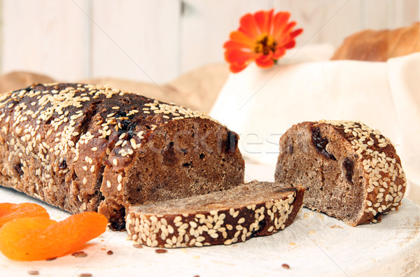 Loaf of rye unleavened  bread without yeast sprinkled sesame Stock photo © user_11056481
