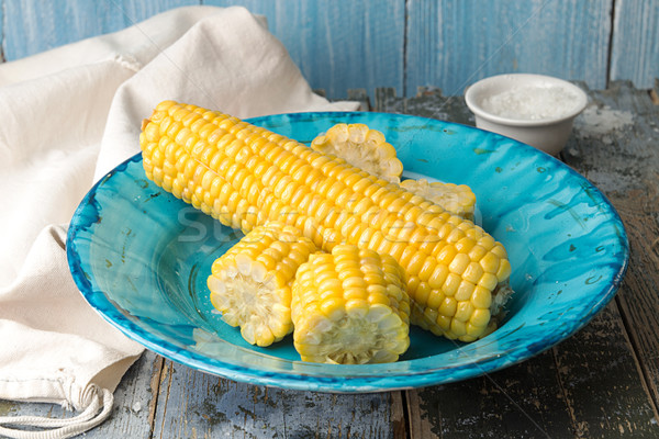 Boiled corn on deep blue plate Stock photo © user_11056481