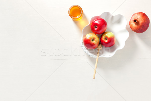 Apples, pomegranate and honey for Rosh Hashanah Stock photo © user_11224430