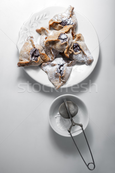 Stock photo: Hamantaschen Cookies for Purim on a white plate.
