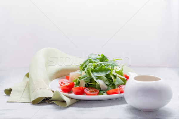 Salad with arugula, tomatoes Stock photo © user_11224430