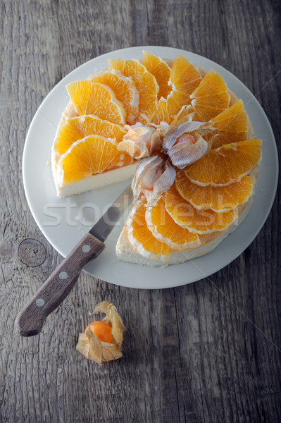 Käsekuchen dekoriert Orangen Kuchen orange Platte Stock foto © user_11224430