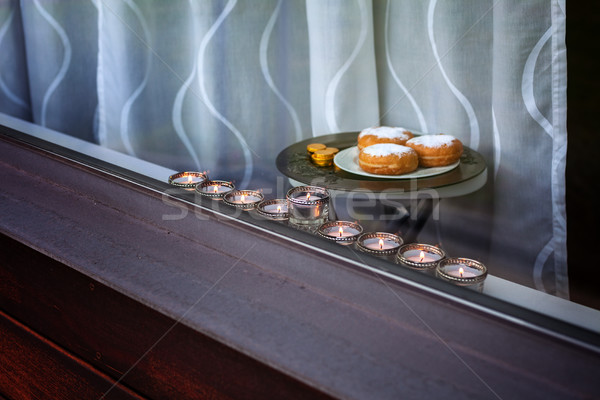 Nine-branched mehorah Hanukiah in the window Stock photo © user_11224430