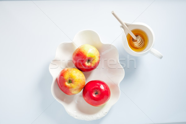Apples, pomegranate and honey for Rosh Hashanah Stock photo © user_11224430