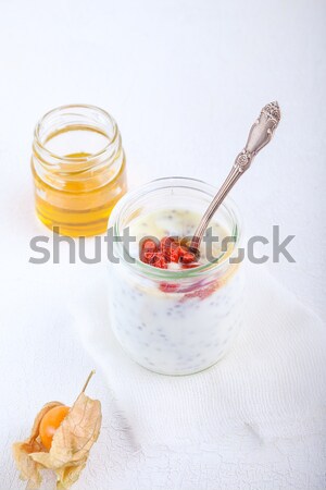 Yoghurt with goji berries, chia seeds and honey Stock photo © user_11224430