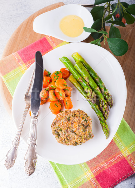 Meat rissole with glazed carrots, asparagus on the plate. Stock photo © user_11224430