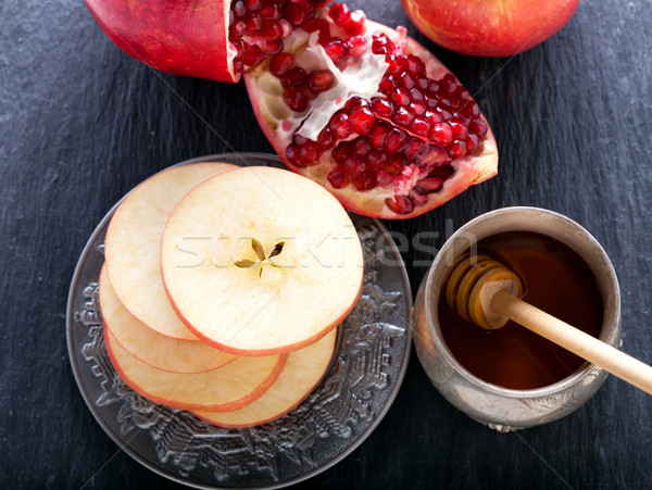 Apples, pomegranate and honey for Rosh Hashanah  Stock photo © user_11224430