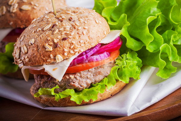 Cheeseburger with salad, onion Stock photo © user_11224430