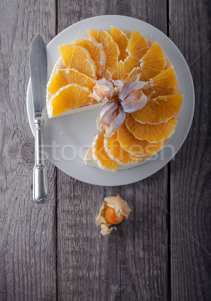 Cheesecake decorated with oranges and physalis. Stock photo © user_11224430