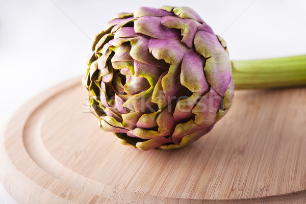 Fresh Artichoke on a wooden plate Stock photo © user_11224430