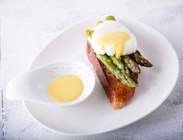 Poached egg and asparagus Stock photo © user_11224430