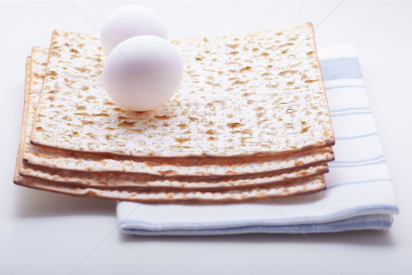 Stock photo: Jewish celebration passover with matza and egg.
