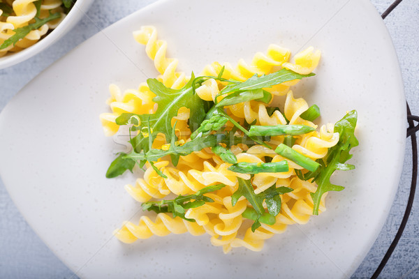 Pasta salad with asparagus and arugula Stock photo © user_11224430