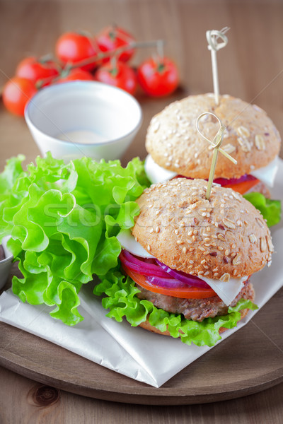 Cheeseburger with salad, onion Stock photo © user_11224430