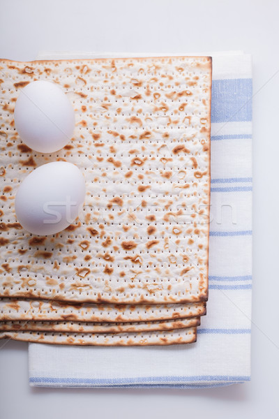 Stock photo: Matza and eggs for Jewish celebration passover
