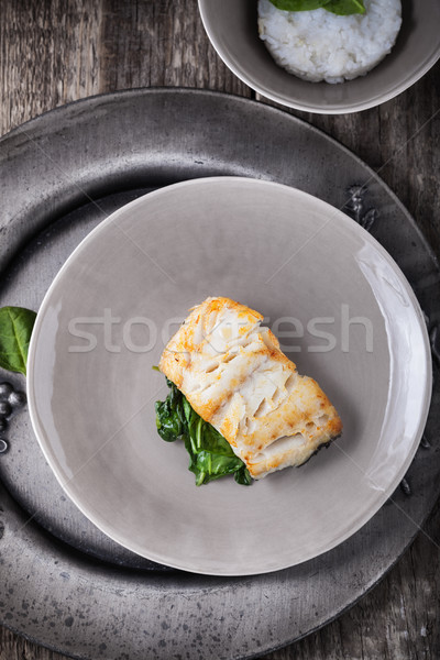 Fried cod fillets and spinach Stock photo © user_11224430