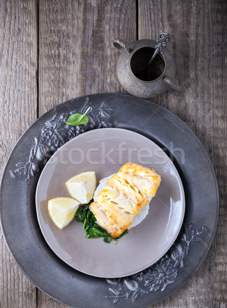 Fried cod fillets and spinach Stock photo © user_11224430