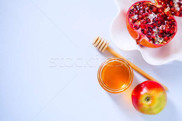 Apples, pomegranate and honey for Rosh Hashanah Stock photo © user_11224430