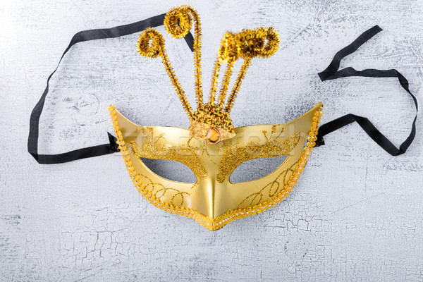 Gold carnival mask on a white background. Stock photo © user_11224430