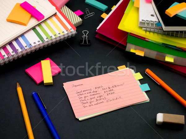 Learning New Language Writing Words Many Times on the Notebook;  Stock photo © user_9323633