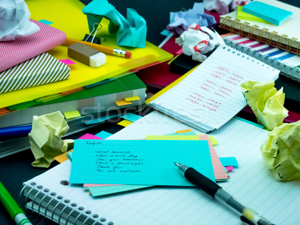 Learning New Language Writing Words Many Times on the Notebook;  Stock photo © user_9323633
