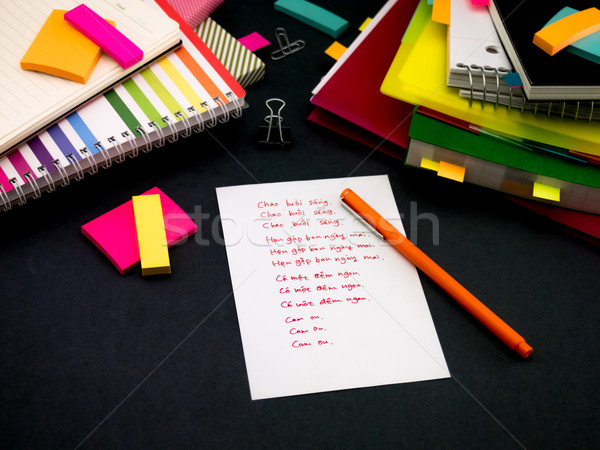 Learning New Language Writing Words Many Times on the Notebook;  Stock photo © user_9323633