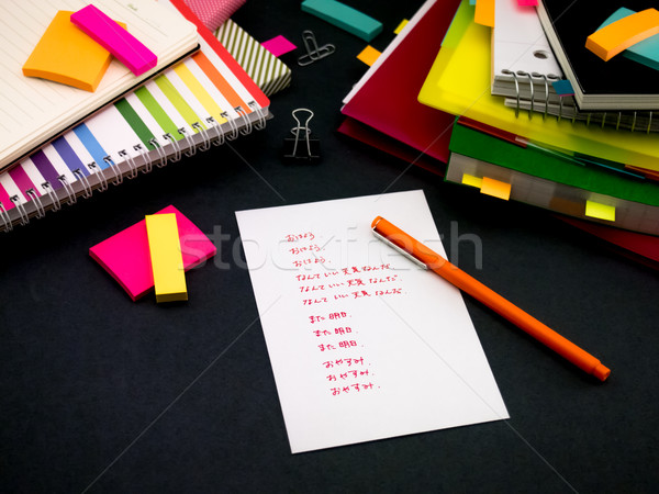 Learning New Language Writing Words Many Times on the Notebook;  Stock photo © user_9323633