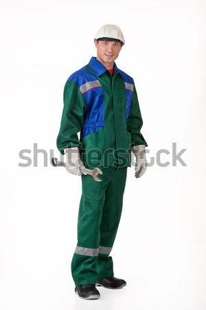 Homem uniforme chave inglesa moço isolado Foto stock © user_9834712