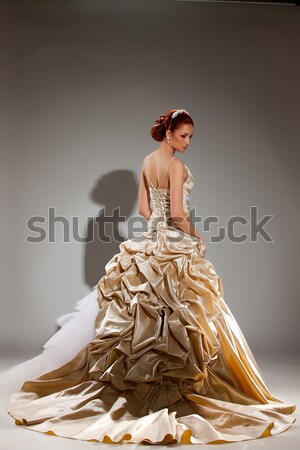 Young Beautiful Woman In Fashionable Dress Stock photo © user_9834712