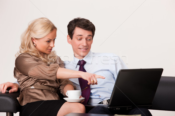 Young Woman And Man with a notebook Stock photo © user_9834712