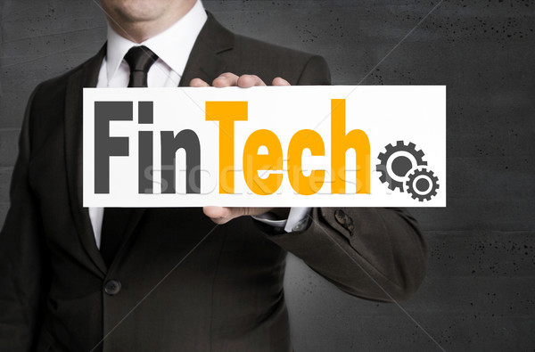 FinTech sign is held by businessman Stock photo © user_9870494