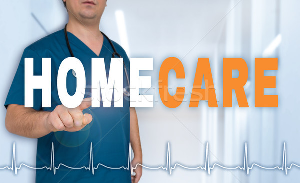 Homecare doctor shows on viewer with heart rate concept Stock photo © user_9870494