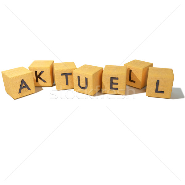 Stock photo: Wooden dice with current, relevance and latest news 