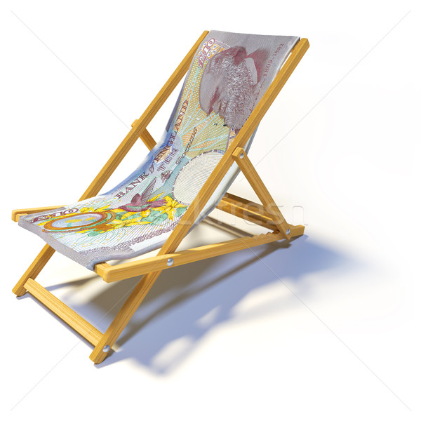 Folding deck chair with 10 english pounds Stock photo © Ustofre9