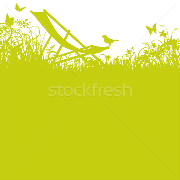 Deck chair with bird in the garden Stock photo © Ustofre9