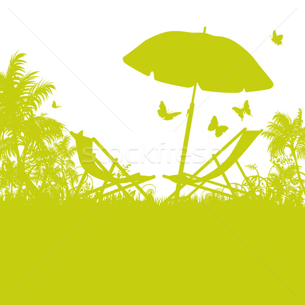 Beach umbrella and deck chairs on palm beach  Stock photo © Ustofre9