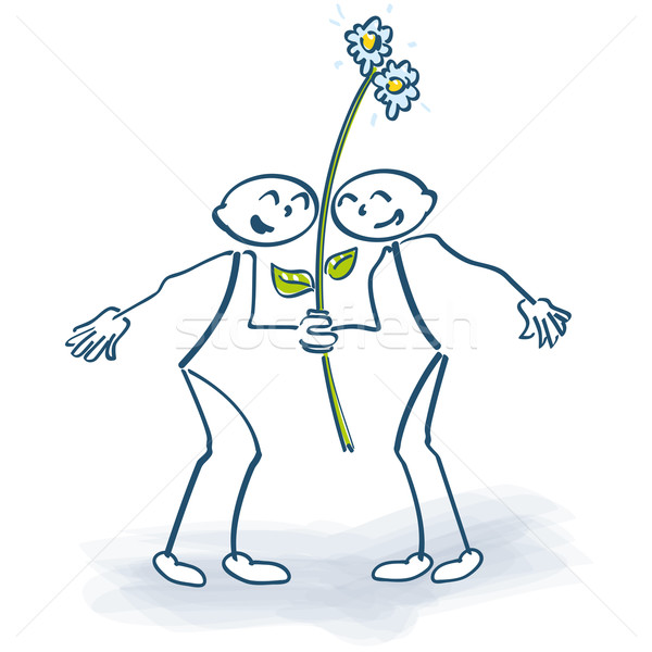 Two stick figures with a flower on a lolly Stock photo © Ustofre9