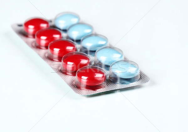 Elección Pack rojo azul pastillas médico Foto stock © vadimmmus